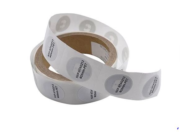 Roll of white labels with black text